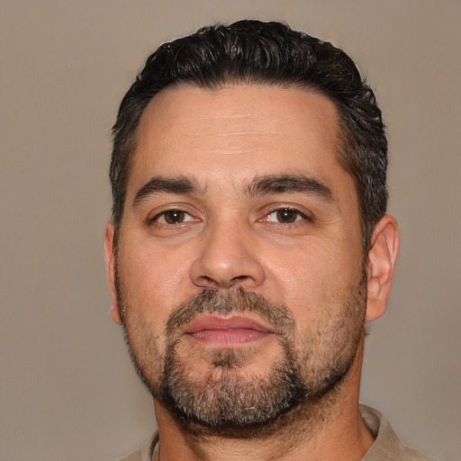 Neutral white adult male with short  black hair and brown eyes