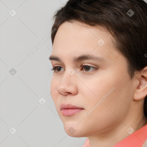 Neutral white young-adult female with short  brown hair and brown eyes