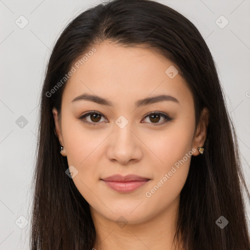 Joyful latino young-adult female with long  brown hair and brown eyes