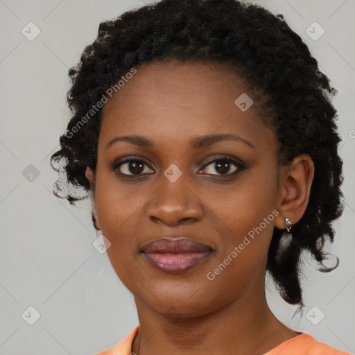 Joyful black young-adult female with medium  black hair and brown eyes