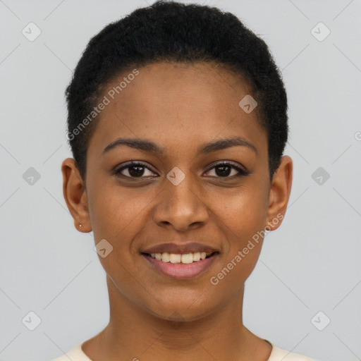 Joyful black young-adult female with short  black hair and brown eyes