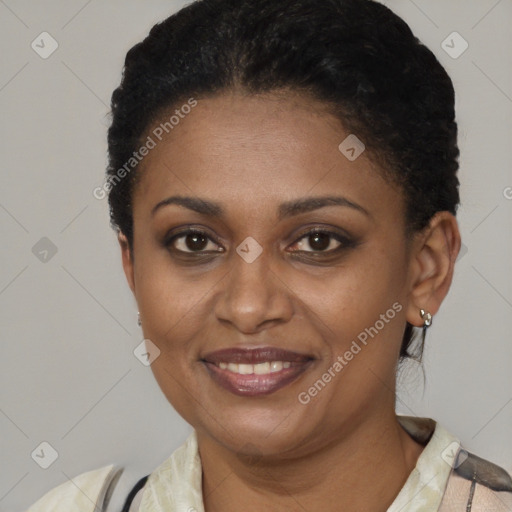 Joyful latino young-adult female with short  black hair and brown eyes