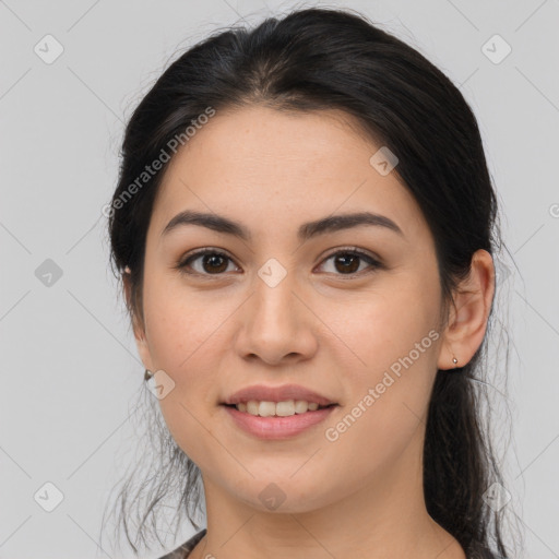 Joyful asian young-adult female with long  brown hair and brown eyes