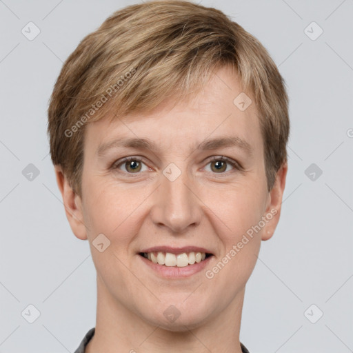 Joyful white adult male with short  brown hair and grey eyes