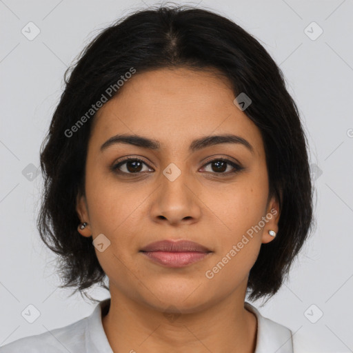 Joyful latino young-adult female with medium  brown hair and brown eyes