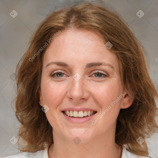 Joyful white young-adult female with medium  brown hair and blue eyes