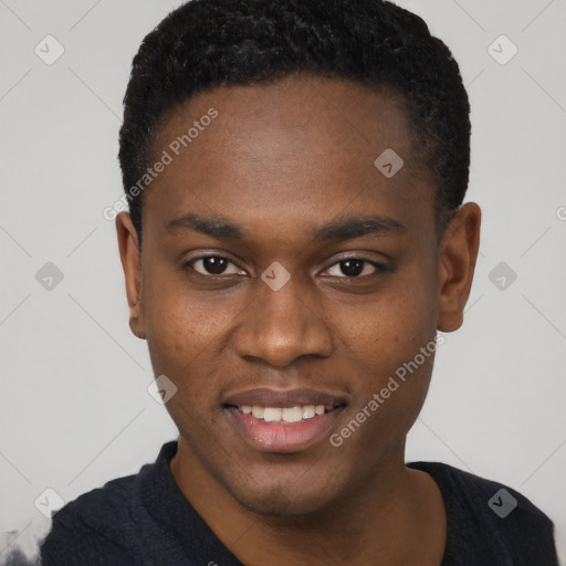 Joyful black young-adult male with short  brown hair and brown eyes