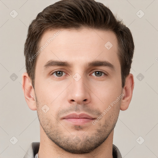 Neutral white young-adult male with short  brown hair and grey eyes