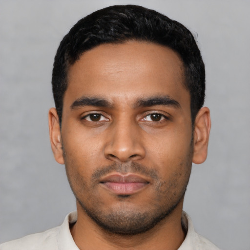 Neutral latino young-adult male with short  black hair and brown eyes