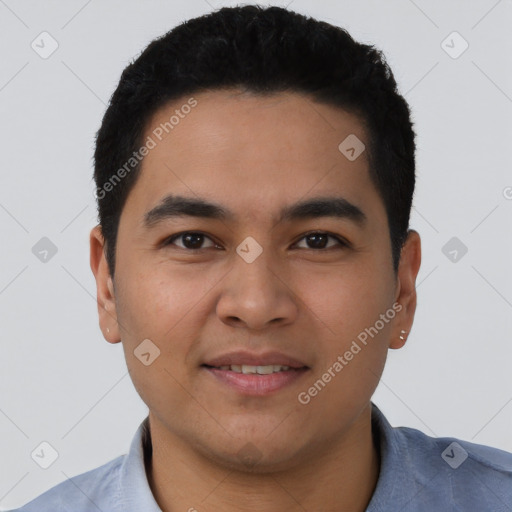 Joyful latino young-adult male with short  black hair and brown eyes