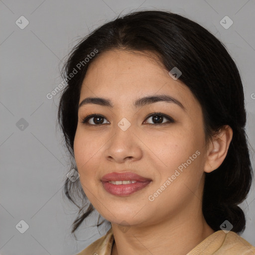 Joyful asian young-adult female with medium  black hair and brown eyes