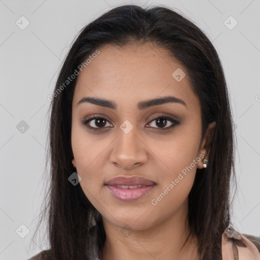 Joyful latino young-adult female with long  brown hair and brown eyes