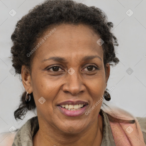 Joyful black adult female with short  brown hair and brown eyes