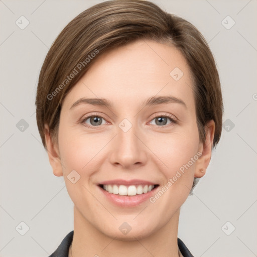 Joyful white young-adult female with short  brown hair and grey eyes