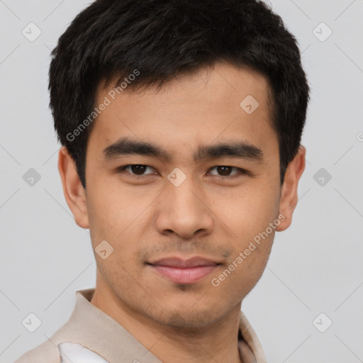 Joyful latino young-adult male with short  brown hair and brown eyes