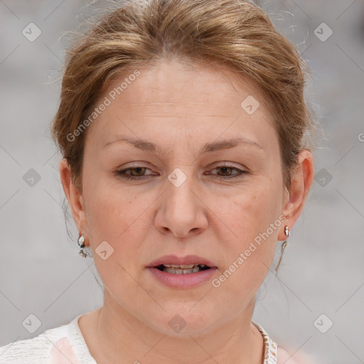 Joyful white adult female with short  brown hair and brown eyes