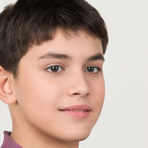 Joyful white child male with short  brown hair and brown eyes