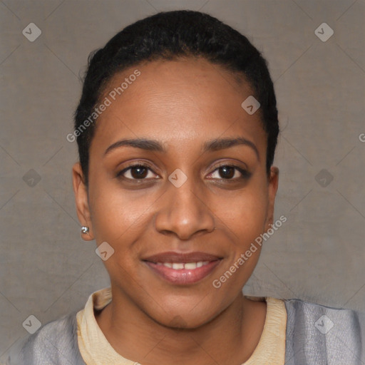 Joyful black young-adult female with short  brown hair and brown eyes