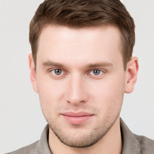 Neutral white young-adult male with short  brown hair and grey eyes