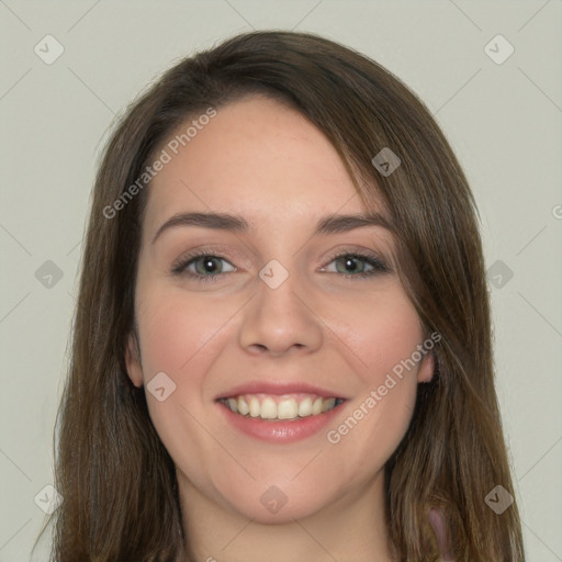 Joyful white young-adult female with long  brown hair and green eyes