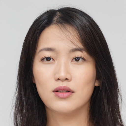 Neutral asian young-adult female with long  brown hair and brown eyes