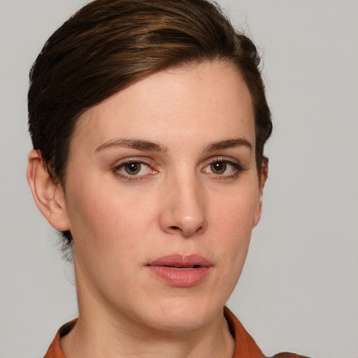 Neutral white young-adult female with short  brown hair and brown eyes