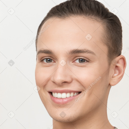 Joyful white young-adult female with short  brown hair and brown eyes