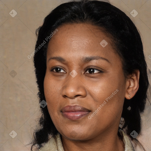 Joyful black adult female with medium  black hair and brown eyes