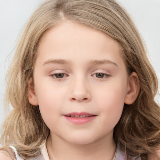 Joyful white child female with long  brown hair and grey eyes