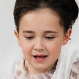 Joyful white child female with medium  brown hair and brown eyes