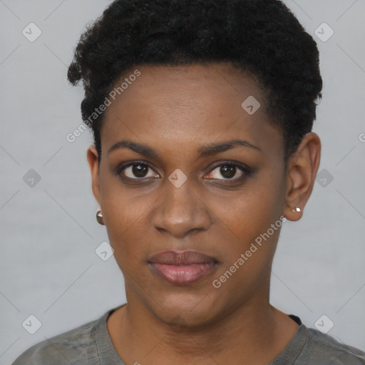 Joyful black young-adult female with short  black hair and brown eyes