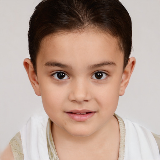 Joyful white child female with short  brown hair and brown eyes