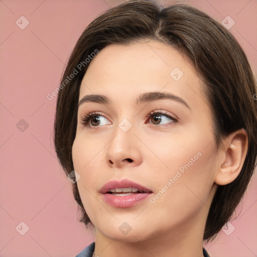 Neutral white young-adult female with medium  brown hair and brown eyes