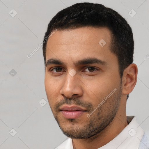 Neutral latino young-adult male with short  black hair and brown eyes