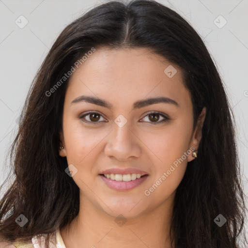 Joyful latino young-adult female with long  brown hair and brown eyes