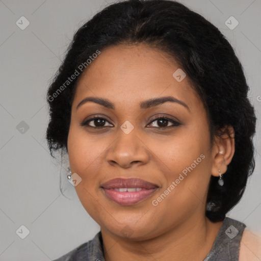 Joyful latino adult female with medium  brown hair and brown eyes