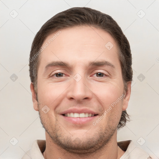 Joyful white young-adult male with short  brown hair and brown eyes