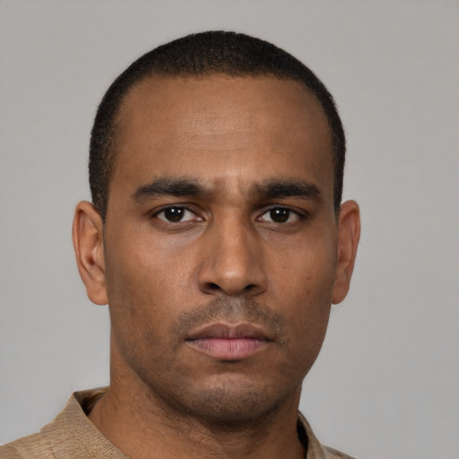 Neutral latino young-adult male with short  brown hair and brown eyes