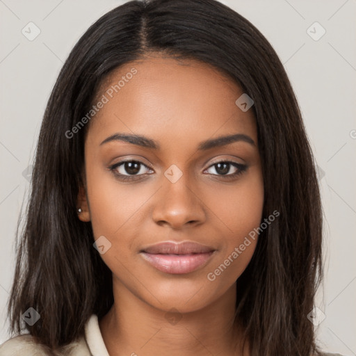 Joyful black young-adult female with long  brown hair and brown eyes