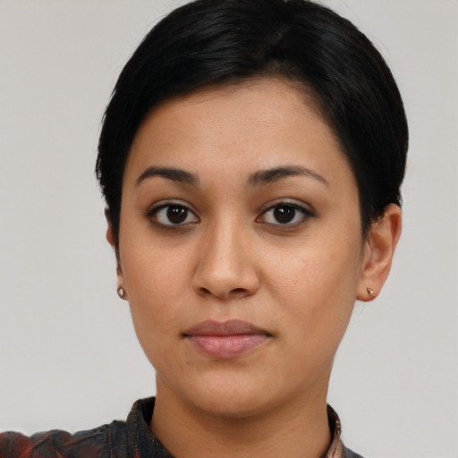 Neutral latino young-adult female with short  black hair and brown eyes