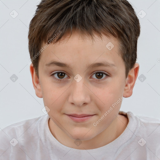 Joyful white child male with short  brown hair and brown eyes