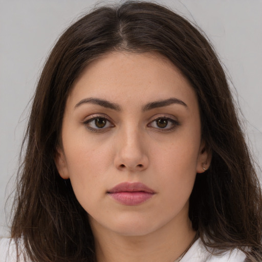 Neutral white young-adult female with long  brown hair and brown eyes