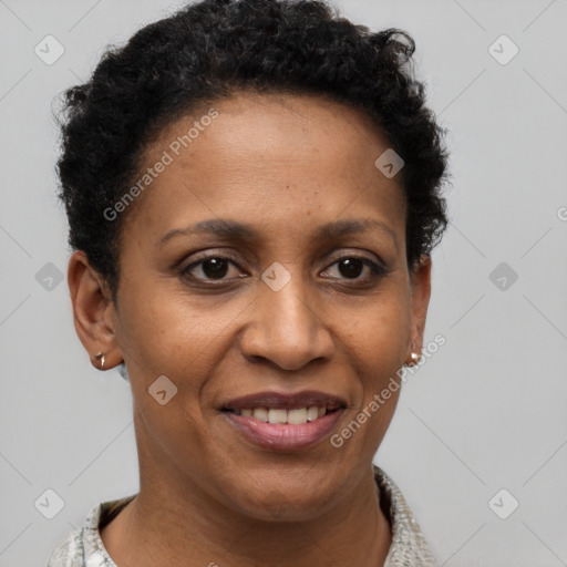 Joyful black adult female with short  brown hair and brown eyes