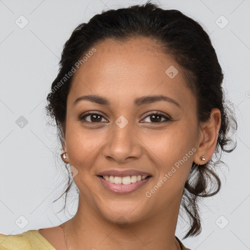 Joyful latino young-adult female with long  brown hair and brown eyes