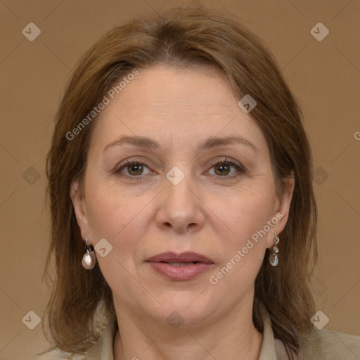 Joyful white adult female with medium  brown hair and brown eyes