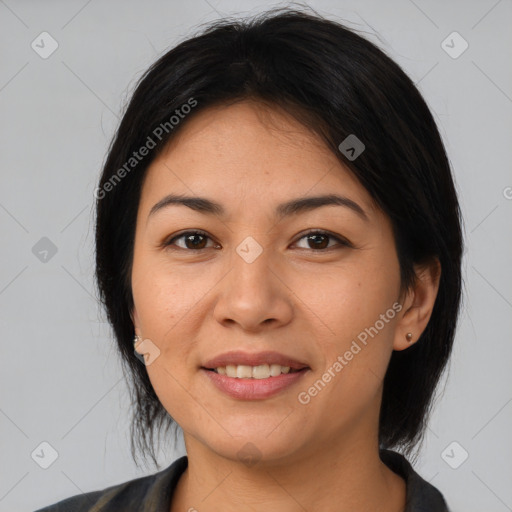 Joyful latino young-adult female with medium  black hair and brown eyes