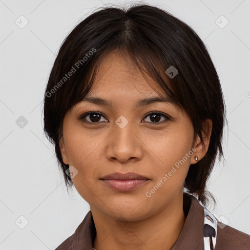 Neutral asian young-adult female with medium  brown hair and brown eyes