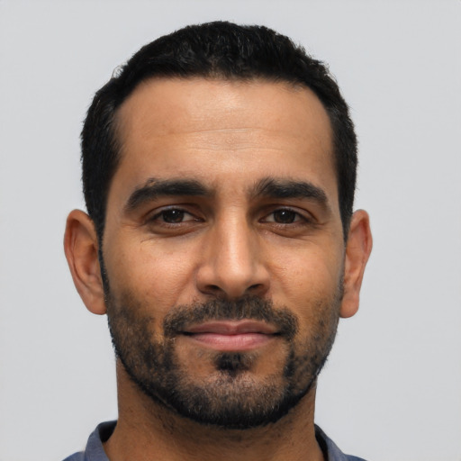 Neutral latino adult male with short  black hair and brown eyes