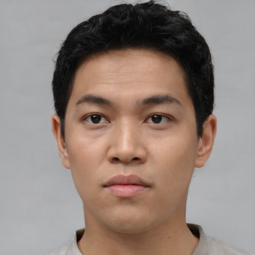 Neutral asian young-adult male with short  black hair and brown eyes