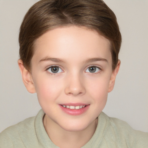 Joyful white child female with short  brown hair and brown eyes